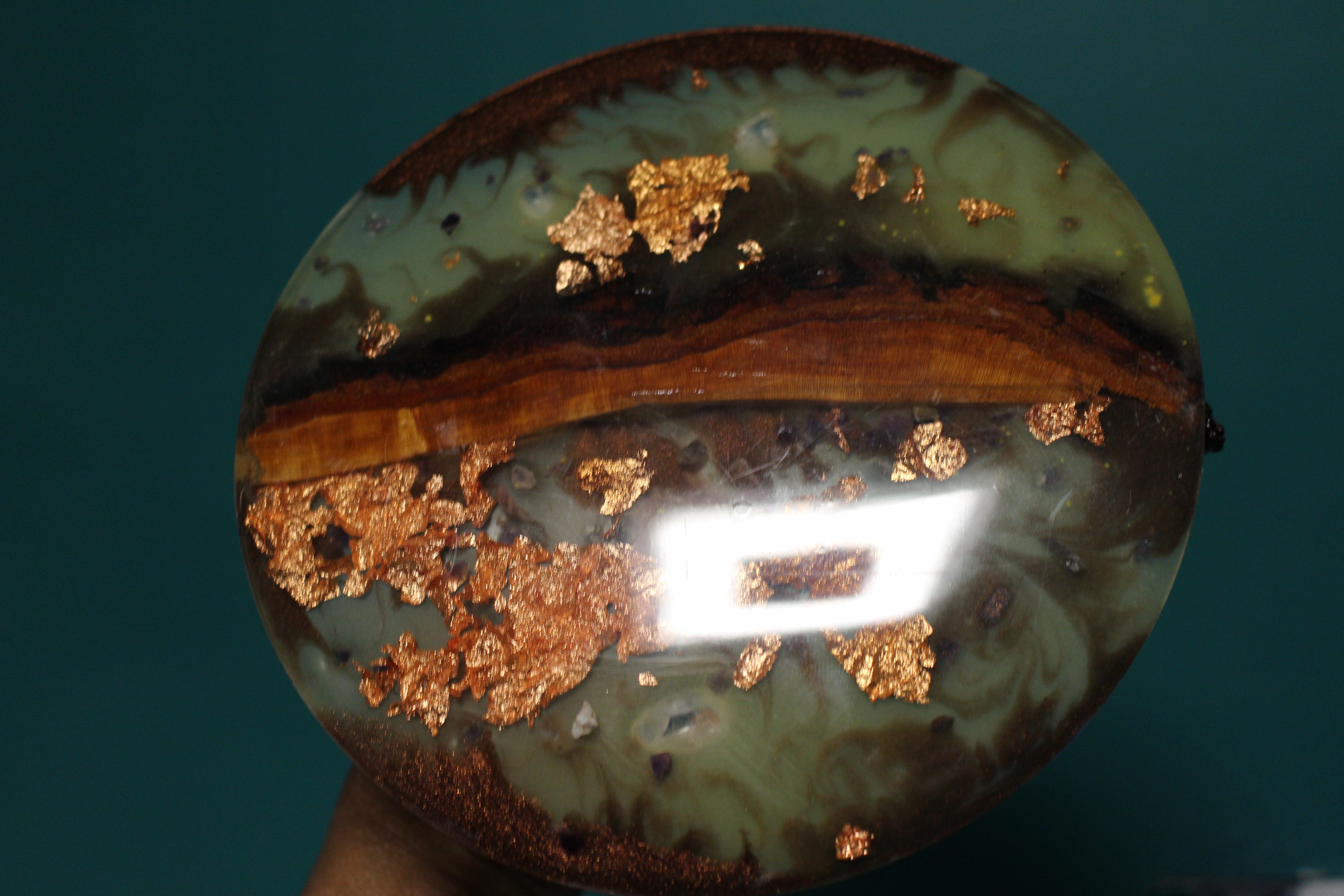 Glow in the dark cherry wood copper piece with crystal accents